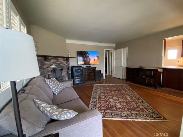 405 Waterview, Playa Del Rey, CA 90293 - living area featuring wood finished floors, a stone fireplace, and beverage cooler