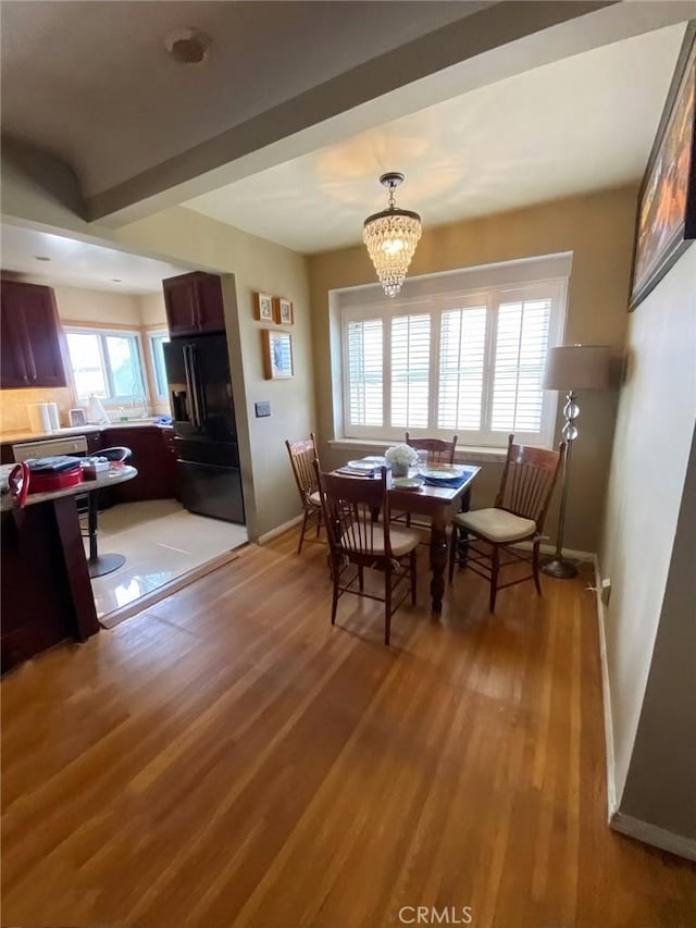 405 Waterview, Playa Del Rey, CA 90293 - dining space with a chandelier, light wood-type flooring, and baseboards