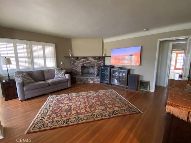 405 Waterview, Playa Del Rey, CA 90293 - living room featuring wood finished floors and a stone fireplace