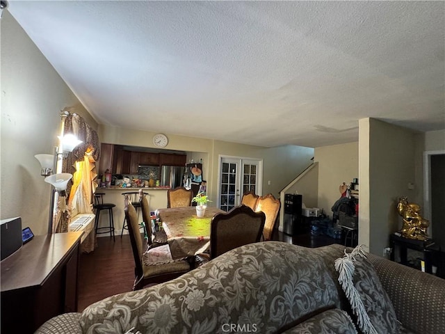 19549 Schoolcraft St, Reseda, CA 91335 - dining space with french doors, a textured ceiling, and dark wood-style floors
