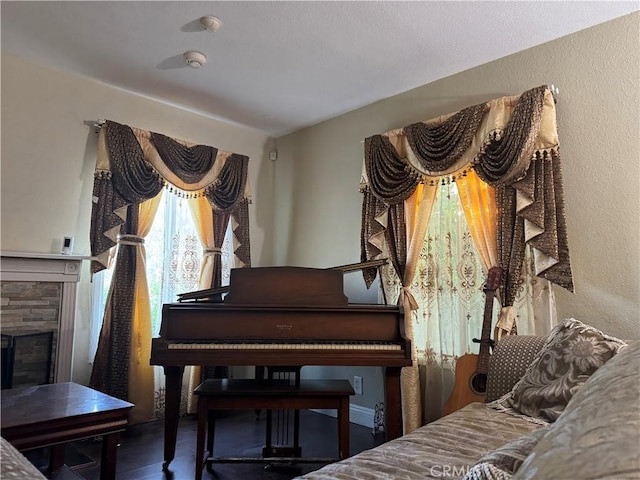 19549 Schoolcraft St, Reseda, CA 91335 - living area featuring a stone fireplace and a textured wall