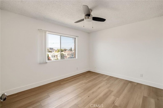 11726 Freeman Ave Unit A, Hawthorne, CA 90250 - spare room with light wood finished floors, a textured ceiling, baseboards, and a ceiling fan