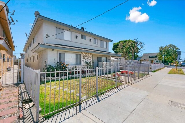 11726 Freeman Ave Unit A, Hawthorne, CA 90250 - view of front of home with stucco siding