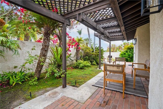 24232 Porto Nuovo, Dana Point, CA 92629 - fenced backyard featuring a pergola and a patio area
