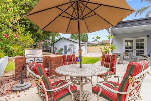 19921 Rambling Rd, Covina, CA 91724 - view of patio / terrace featuring french doors, outdoor dining space, and an outbuilding
