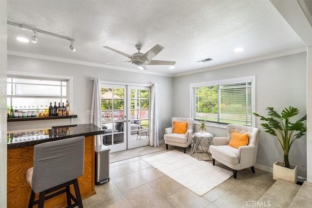 19921 Rambling Rd, Covina, CA 91724 - sitting room with ornamental molding, a dry bar, a ceiling fan, light tile patterned floors, and recessed lighting