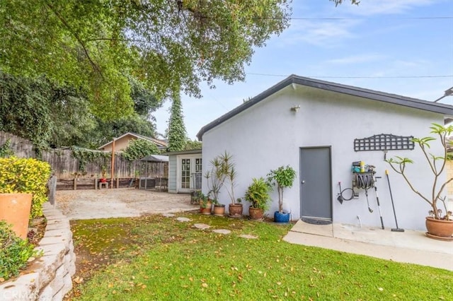 19921 Rambling Rd, Covina, CA 91724 - back of property featuring a patio area and stucco siding