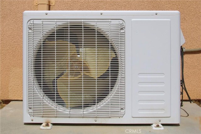 1910 Artesia Ave, Landers, CA 92285 - exterior view of a cooling unit and stucco siding
