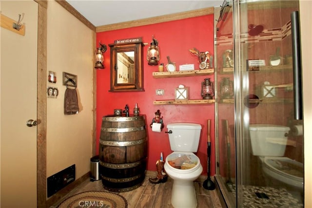 1910 Artesia Ave, Landers, CA 92285 - bathroom featuring a stall shower and wood finished floors