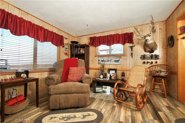 1910 Artesia Ave, Landers, CA 92285 - living area with wooden walls and wood finished floors