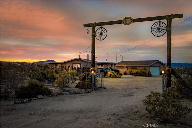 1910 Artesia Ave, Landers, CA 92285 - single story home featuring a garage
