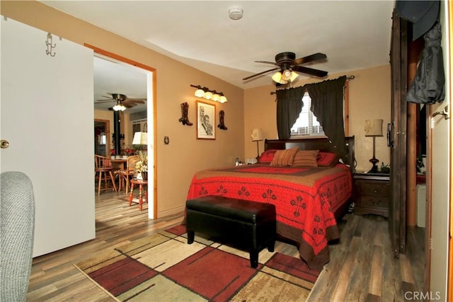 1910 Artesia Ave, Landers, CA 92285 - bedroom featuring wood finished floors and a ceiling fan