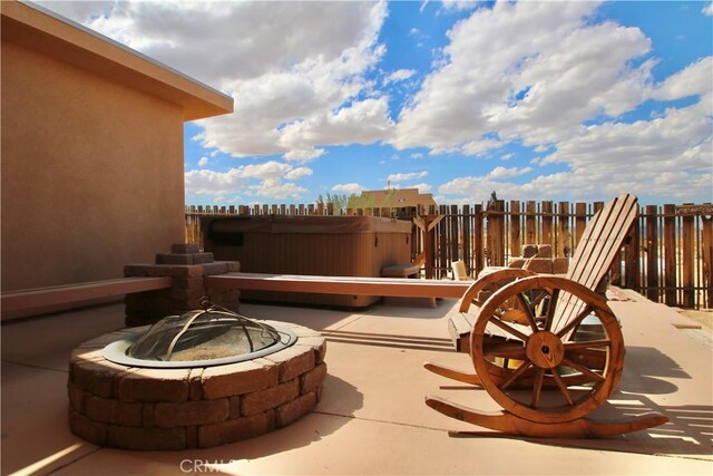 1910 Artesia Ave, Landers, CA 92285 - view of patio / terrace featuring a fire pit