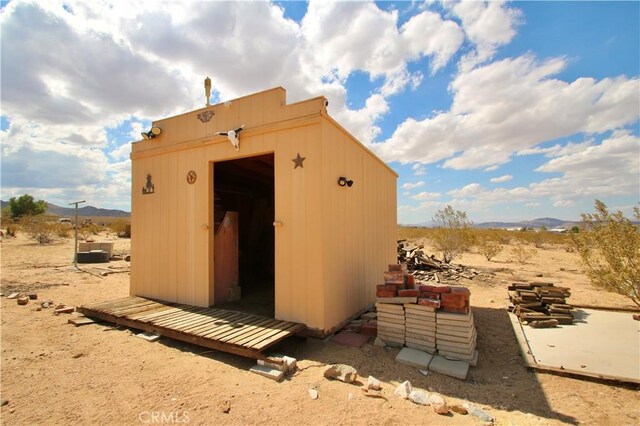 1910 Artesia Ave, Landers, CA 92285 - view of shed with a mountain view