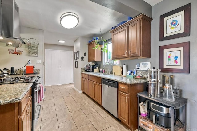 118 W 11th Ave, Escondido, CA 92025 - kitchen with appliances with stainless steel finishes, island exhaust hood, a sink, brown cabinets, and light stone counters