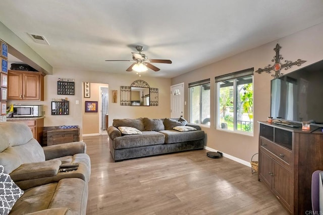 118 W 11th Ave, Escondido, CA 92025 - living area featuring baseboards, a ceiling fan, and light wood-style floors