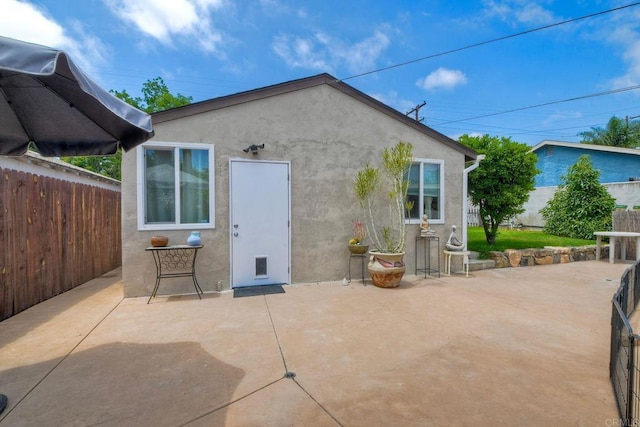 118 W 11th Ave, Escondido, CA 92025 - back of house with a patio area and stucco siding