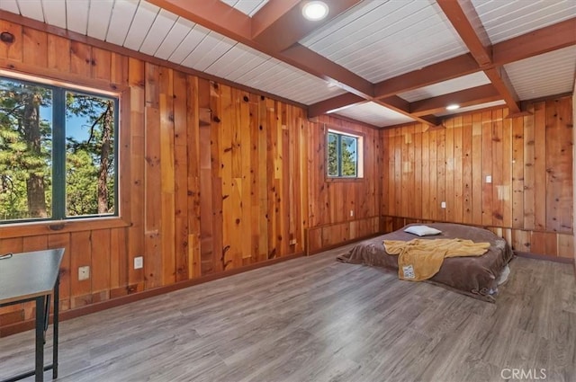 26745 Hopkins Rd, Idyllwild, CA 92549 - unfurnished bedroom featuring wood finished floors, beamed ceiling, wooden walls, and baseboards
