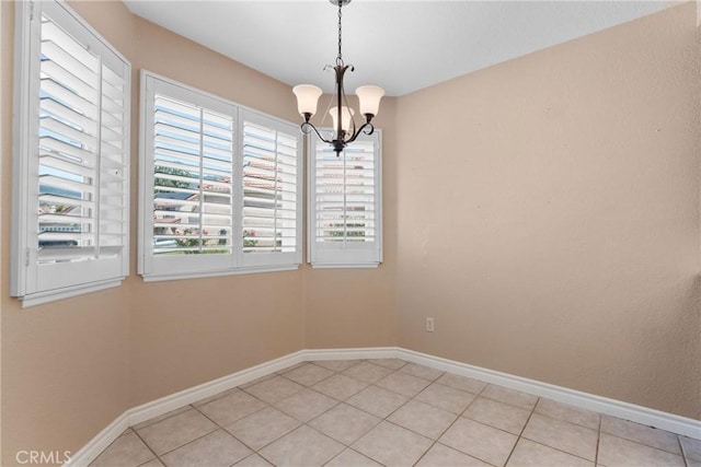 1214 Mallorca St, Upland, CA 91784 - unfurnished room featuring a chandelier, baseboards, and light tile patterned floors