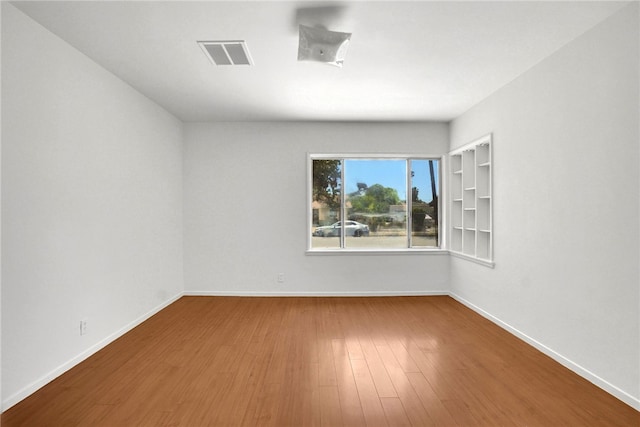 233 Russell Ave, Monterey Park, CA 91755 - empty room with wood finished floors and baseboards