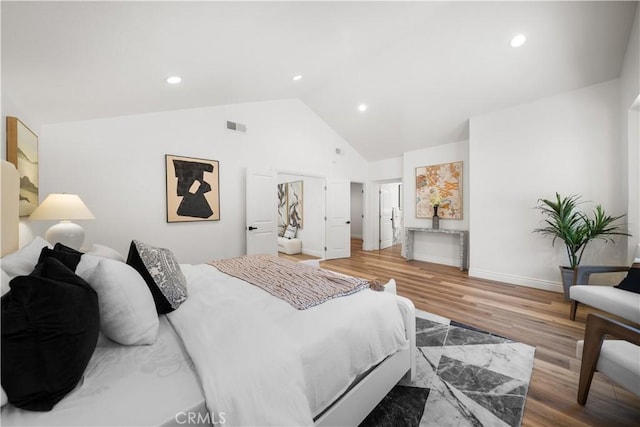 22011 La Puente Rd, Walnut, CA 91789 - bedroom with wood finished floors, recessed lighting, baseboards, and high vaulted ceiling