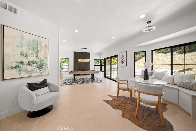 22011 La Puente Rd, Walnut, CA 91789 - living room featuring billiards, plenty of natural light, recessed lighting, and baseboards