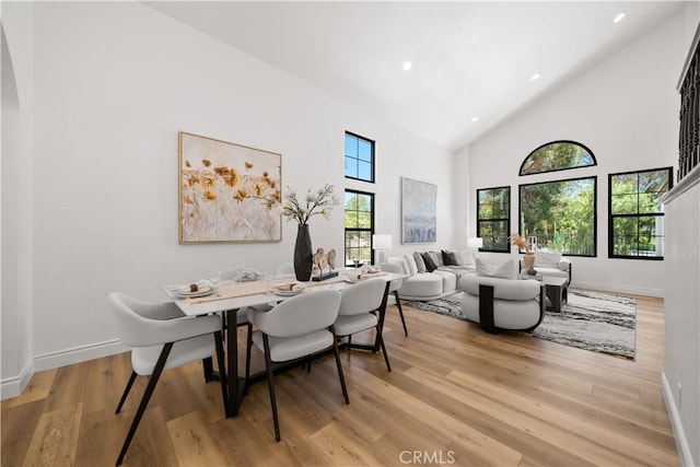 22011 La Puente Rd, Walnut, CA 91789 - dining room with light wood-style floors, baseboards, high vaulted ceiling, and recessed lighting