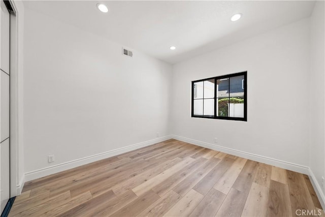 22011 La Puente Rd, Walnut, CA 91789 - spare room with baseboards, light wood-type flooring, and recessed lighting