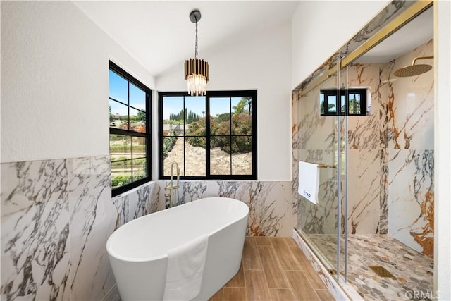 22011 La Puente Rd, Walnut, CA 91789 - full bath featuring tile walls, healthy amount of natural light, a marble finish shower, a soaking tub, and vaulted ceiling
