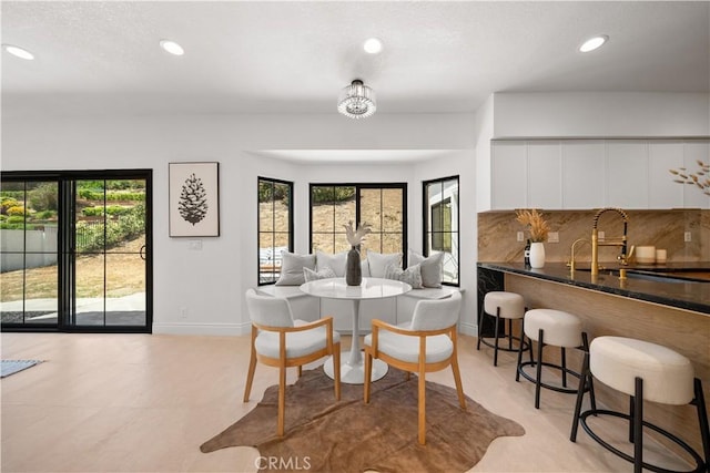 22011 La Puente Rd, Walnut, CA 91789 - dining space featuring recessed lighting, baseboards, and a textured ceiling