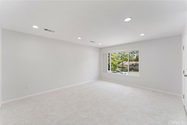 1121 S Dover Cir Unit C44K, Anaheim, CA 92805 - empty room with recessed lighting, light carpet, and baseboards