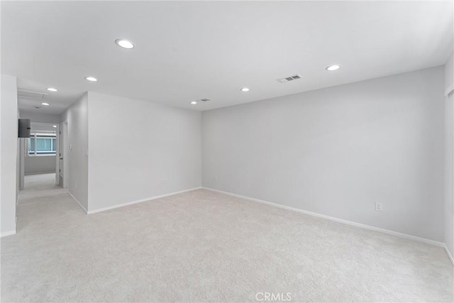 1121 S Dover Cir Unit C44K, Anaheim, CA 92805 - empty room featuring light carpet, recessed lighting, and baseboards