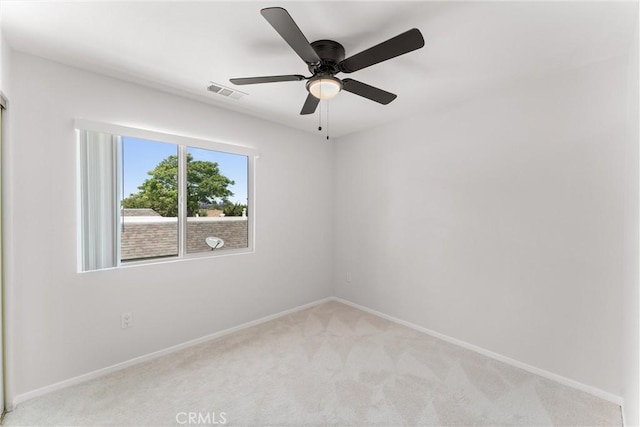 1121 S Dover Cir Unit C44K, Anaheim, CA 92805 - unfurnished room with light colored carpet, baseboards, and ceiling fan
