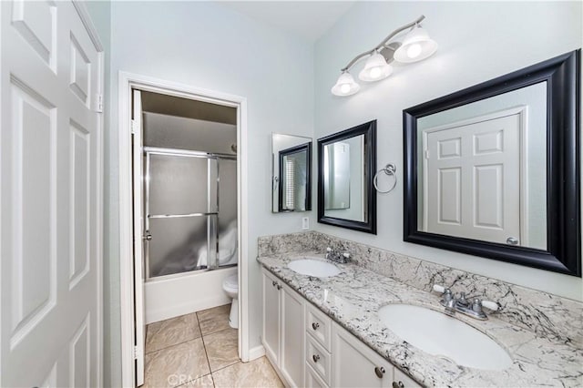 4536 Montecito Dr, La Palma, CA 90623 - bathroom featuring double vanity, toilet, and combined bath / shower with glass door