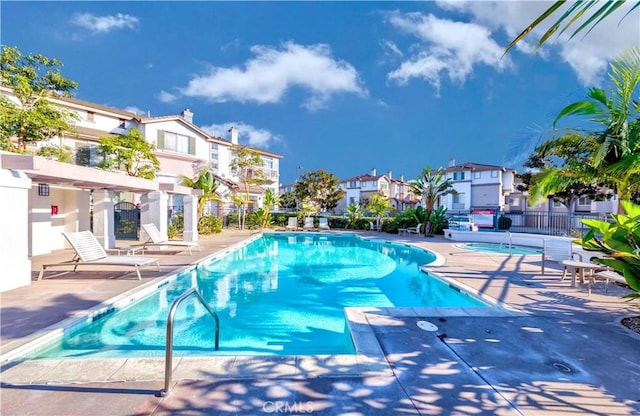 4536 Montecito Dr, La Palma, CA 90623 - community pool featuring a residential view and a patio area