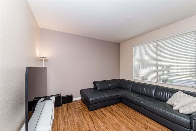 4536 Montecito Dr, La Palma, CA 90623 - living room with light wood-style flooring and baseboards