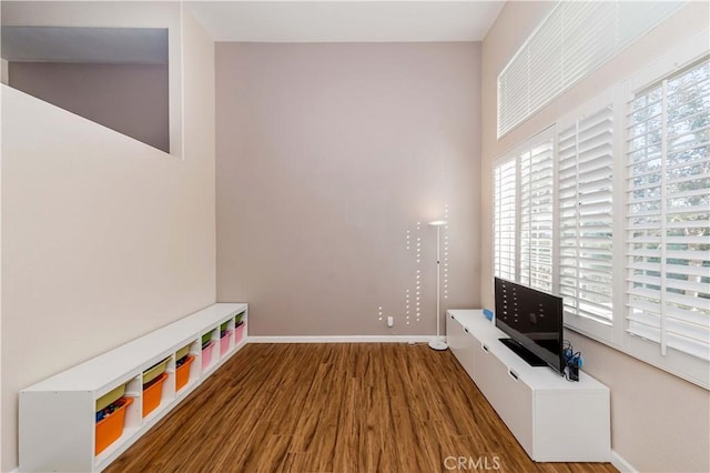 4536 Montecito Dr, La Palma, CA 90623 - unfurnished room with wood finished floors, healthy amount of natural light, and baseboards