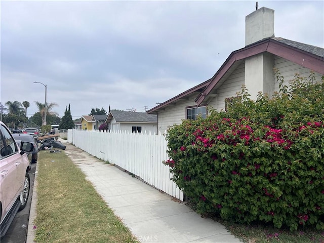 1903 E 59th St, Long Beach, CA 90805 - view of asphalt road with street lighting and sidewalks