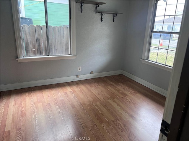 1903 E 59th St, Long Beach, CA 90805 - empty room featuring wood finished floors and baseboards
