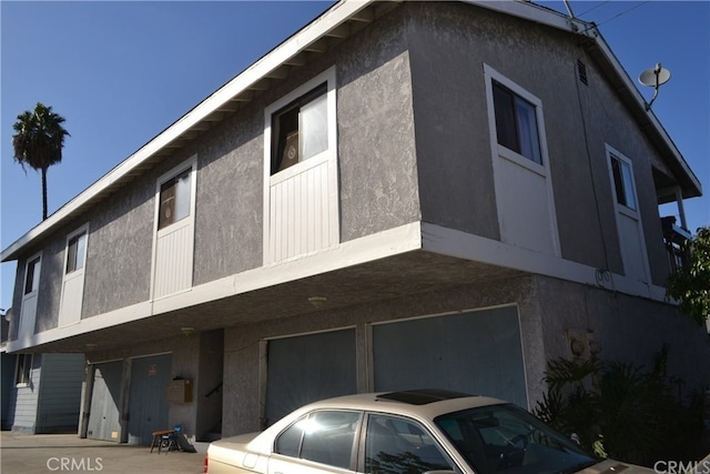 1452 Pacific Ave, Long Beach, CA 90813 - view of building exterior with an attached garage