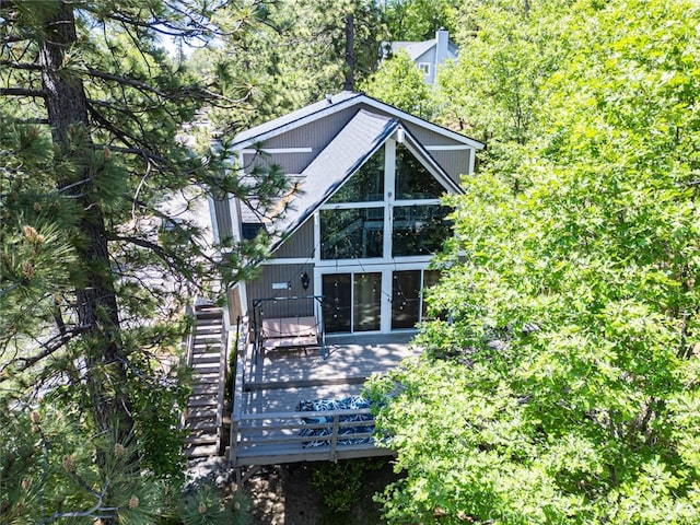 27638 St Bernard Ln, Lake Arrowhead, CA 92352 - rear view of house with a wooden deck