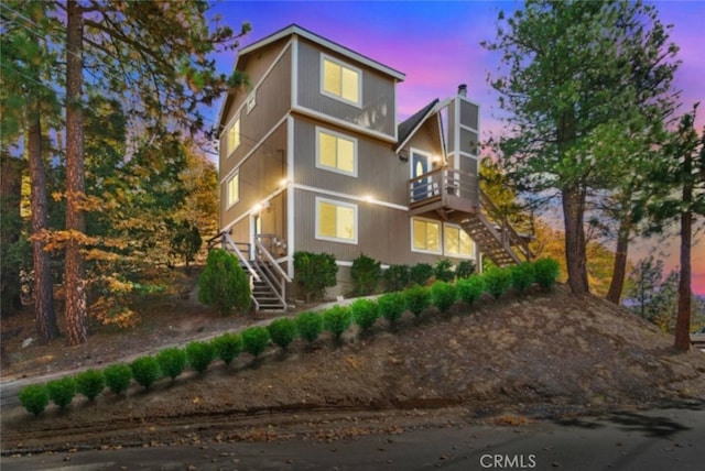 27638 St Bernard Ln, Lake Arrowhead, CA 92352 - view of front of property with stairs and a chimney