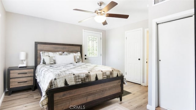 27638 St Bernard Ln, Lake Arrowhead, CA 92352 - bedroom with light wood finished floors and a ceiling fan