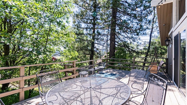 27638 St Bernard Ln, Lake Arrowhead, CA 92352 - wooden deck with outdoor dining space