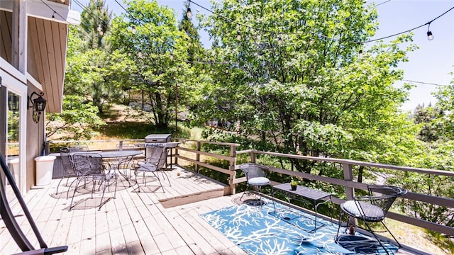 27638 St Bernard Ln, Lake Arrowhead, CA 92352 - deck featuring area for grilling and outdoor dining area