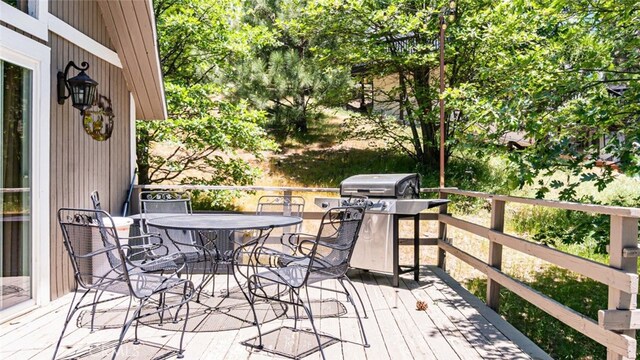 27638 St Bernard Ln, Lake Arrowhead, CA 92352 - deck featuring area for grilling and outdoor dining space