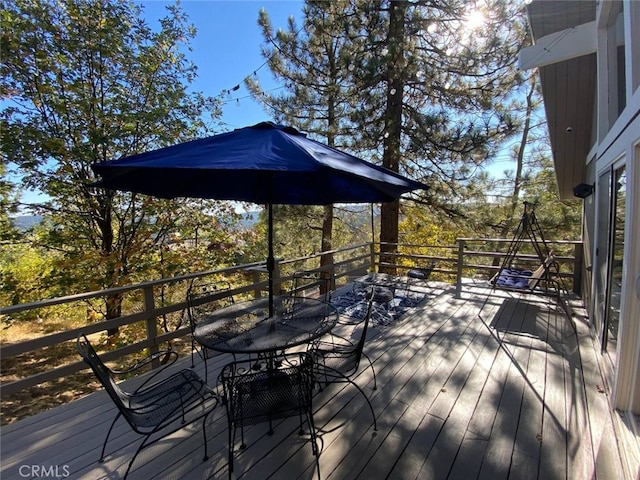 27638 St Bernard Ln, Lake Arrowhead, CA 92352 - wooden deck featuring outdoor dining space