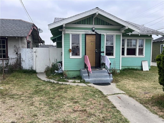 1909 E 59th St, Long Beach, CA 90805 - view of front of house with a gate