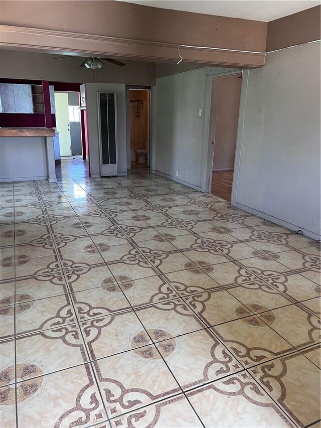 1909 E 59th St, Long Beach, CA 90805 - spare room with a ceiling fan
