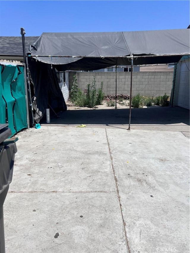 1909 E 59th St, Long Beach, CA 90805 - view of patio / terrace featuring a carport